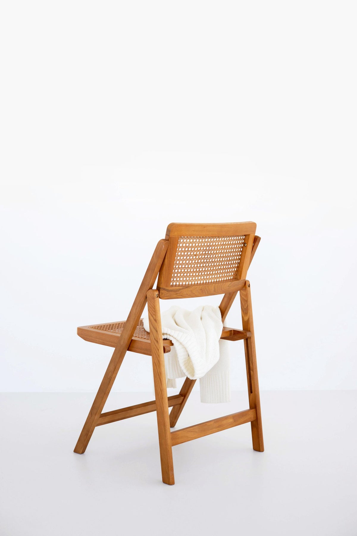 Soren Woven-Back Dining Chair – Natural Wood Cane Chair, Scandinavian Kitchen Seating, Minimalist Japandi Dining Accent – lifestyle image 2